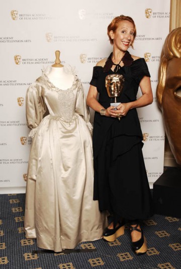 Michele Clapton, winner of  the Costume Design Award for The Devil's Whore, poses with one of her BAFTA-winning creations (BAFTA / Richard Kendal).