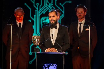 The team from Uncharted 4 team accept their award for Best Game 