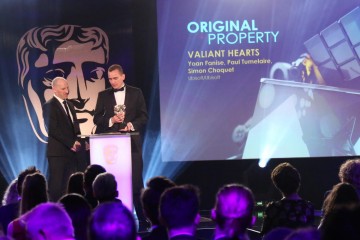 The Valiant Hearts team accept the award for Original Property at the British Academy Games Awards Ceremony in 2015