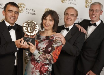 The BBC Wales team poses with their newly acquired BAFTA Cymru Award