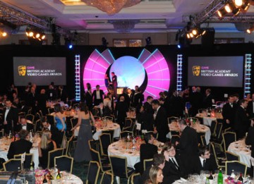 Guests settle down to a sumptuous three-course dinner in the Ballroom at the London HIlton Hotel (BAFTA / James Kennedy).
