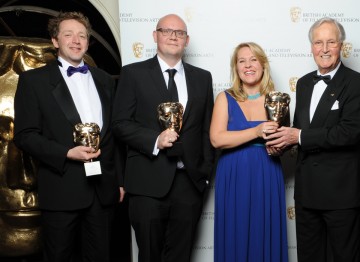The team behind The Cube celebrate their BAFTA win with radio and television presenter Nicholas Parsons.