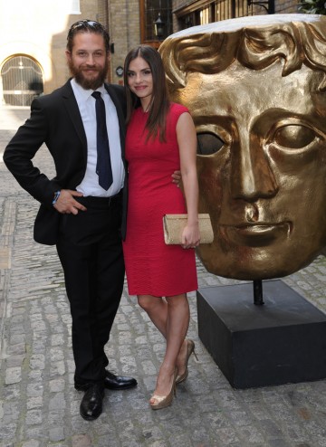 Charlotte Riley and boyfriend Tom Hardy arrive at the BAFTA TV Craft Awards.