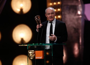 Barry Ackroyd accepts the award for Cinematography for this work on The Hurt Locker (BAFTA/Brian Ritchie).