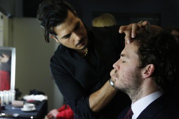 Sam Claflin is styled by a Lancôme make up artist ready for the EE British Academy Film Awards nominations announcement on 9 January 2015