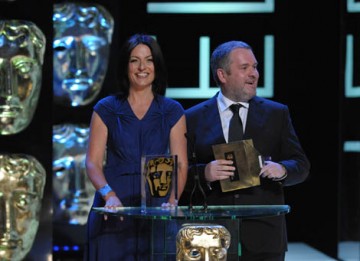 Egged on by Davina McCall, Radio DJ Chris Moyles impersonates comedian Michael McIntyre before the pair presented the Philips Audience Award - the only award of the night voted for by the public (BAFTA / Marc Hoberman).