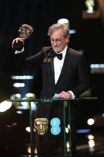 Steven Spielberg accepts the award for Supporting Actor on behalf of Mark Rylance at the 2016 EE British Academy Film Awards