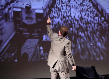 Simon Beaufoy referencing to some of his images at the lecture. (Photography: Jay Brooks) 