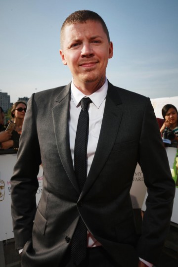 Professor Green smiles for the camera on the red carpet