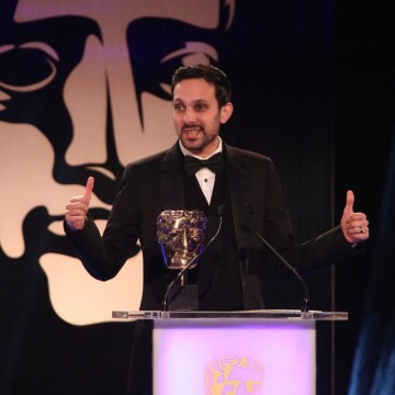 Dynamo presents the award for Best Game at the British Academy Games Awards in 2015