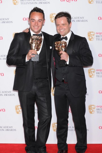 Presenters and winners in the press room backstage at the Arqiva British Academy Television Awards at the Theatre Royal on 18 May 2014.