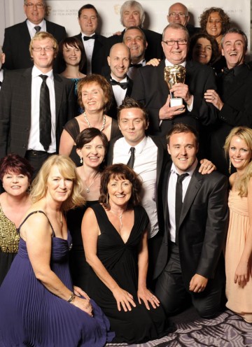 The behind-the-scenes talent of Coronation Street celebrate recieving the Academy's Special Award with some of the show's more recognisable faces. 