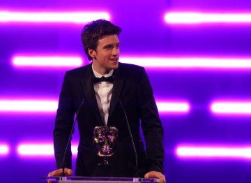 Radio 1 DJ and TV presenter Greg James announces the winner for Original Music.