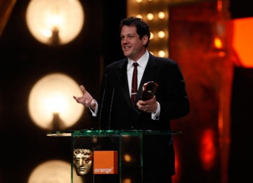 Michael Giacchino takes to the stage to accept his award in the Music category for the animated film Up. (BAFTA/Brian Ritchie).