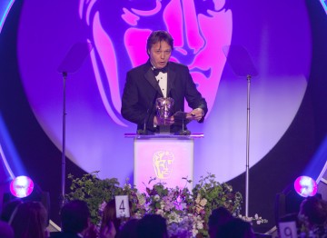 Great Expectations Actor Shaun Dooley presents the BAFTA for Writer.