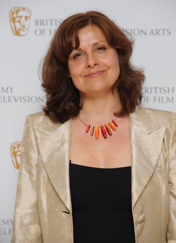 The Thick Of It star Rebecca Front poses for the waiting press before presenting the Editing Fiction Award. 