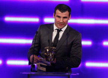 The former boxer, described by Ricky Hatton as "the best British fighter we've ever had" announces this year's Sports winner.  (Pic: BAFTA/Brian Ritchie)