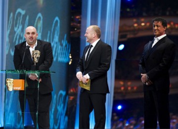 A jubilant Shane Meadows and Mark Herbert collect This is England's BAFTA for Best British Film from Sylvester Stallone (pic: BAFTA / Camera Press).