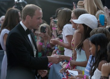 Fans who crowded outside the Belasco Theatre in LA were rewarded with a hand shake from the the Royal couple