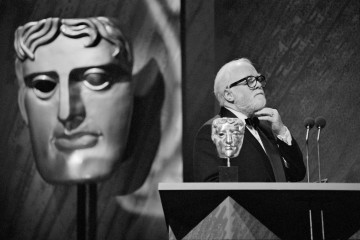 Richard Attenborough celebrates winning the Alexander Korda Award for Best British Film for Shadowlands at the British Academy Film and Television Awards in 1994.