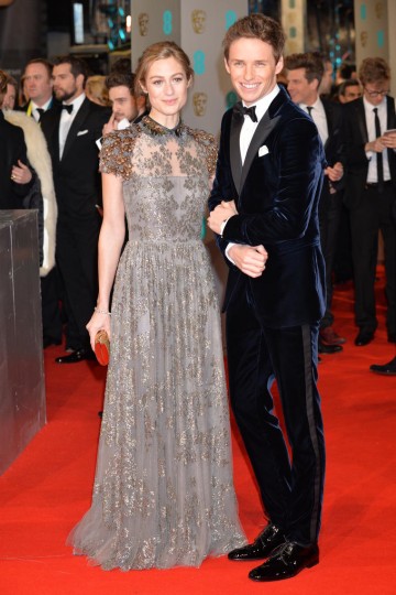 Eddie Redmayne and wife Hannah Bagshawe arrive on the red carpet