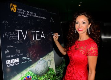 Actress Sofia Milos signs the TV party arrivals board