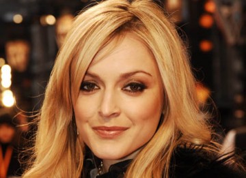 Radio and TV presenter Fearne Cotton was one of the first to hit the red carpet. (BAFTA/ Richard Kendal.)