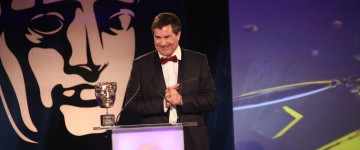 David Braben accepts the Games Fellowship at the British Academy Games Awards in 2015