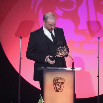 Jake Martin accepts the award for Editing: Factual at the British Academy Television Craft Awards in 2015