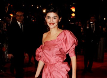 Audrey Tautou, Leading Actress nominee for Coco Before Chanel arrives on the red carpet in a striking pink dress (BAFTA/Richard Kendal).