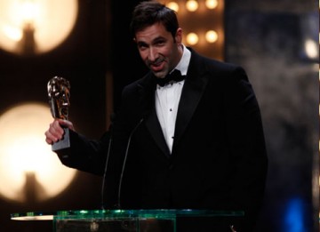 Co-writer Sheldon Turner accepts the award for Adapted Screenplay for his film Up in the Air. Jason Reitman was unable to attend the ceremony (BAFTA/Brian Ritchie).