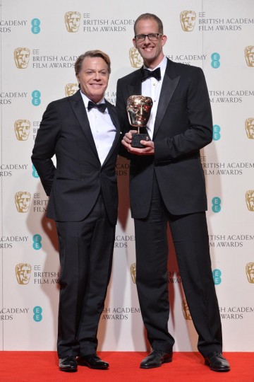 Pete Doctor, winner of the Animated Film award for Inside Out. Pictured with presenter Eddie Izzard