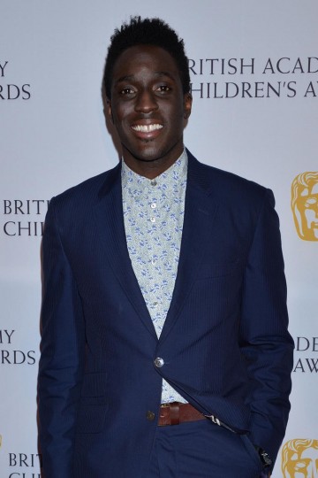 Presenter Andy Akinwolere on the red carpet at the British Academy Children's Awards in 2014