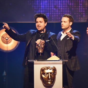 Sam Nixon and Mark Rhodes collect the BAFTA for Presenter at the British Academy Children's Awards in 2015