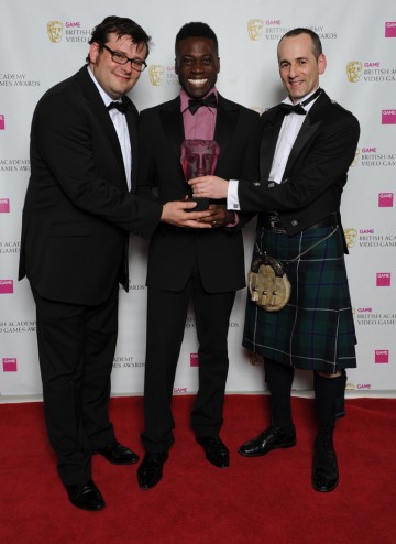 Presenter Ortis Deley (centre) with Colin Blackwood and Kevin Flynn from Electronic Arts. This game saw off stiff competition from nine other titles in the public vote.