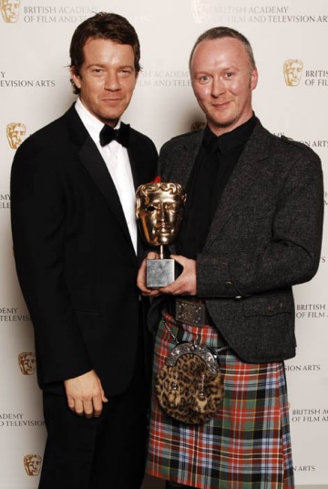 Neville Kidd celebrates his Photography Factual win for A History of Scotland (BAFTA / Richard Kendal).