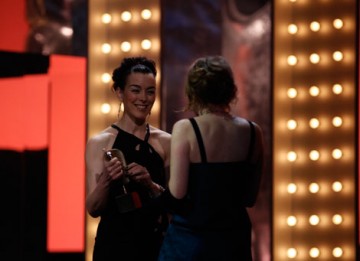 Director Emma Lazenby joins actress Olivia Williams on stage to accept the Short Animation Award (BAFTA/Brian Ritchie).