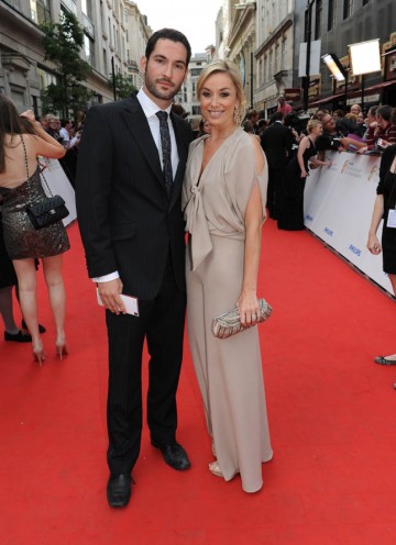 Sweet Charity star Tamsin Outhwaite arrives on the red carpet with her husband, Miranda actor, Tom Eliis. (BAFTA/Richard Kendal).