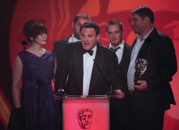 Visual effects agency The Mill collect this award for their VFX work on Merlin. (Pic: BAFTA/Jamie Simonds)