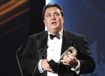 Nintendo's David Yarnton collects one of Wii Sports' six Awards