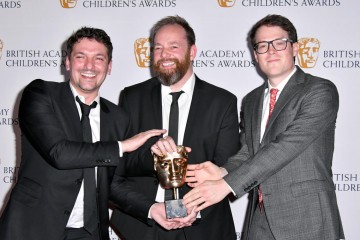 Ben Bocquelet, Mic Graves and Joe Parham, writers of The Amazing World of Gumball, with their award