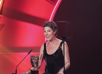 British Actress and comedienne Tamis Greig announces the nominations for the Writer Award on the Television Craft stage. (Pic: BAFTA/Jamie Simonds)