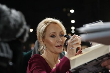 JK Rowling signs autographs for fans