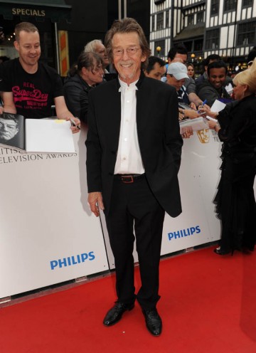 John Hurt arrives at the London Palladium to find out if he has won the Leading Actor award for his role in An Englishman In New York (BAFTA/Richard Kendal).
