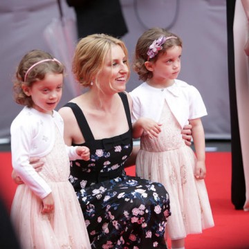 Laura Carmichael poses with the twins who play her daughter Marigold on the television series.