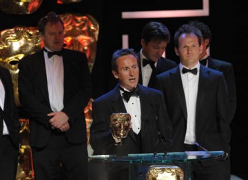 BBC Two's tribe presenter Bruce Parry was joined on stage by Steve Robinson and Sam Organ to accept the Factual Series award for the documentary series Amazon with Bruce Parry (BAFTA / Marc Hoberman).