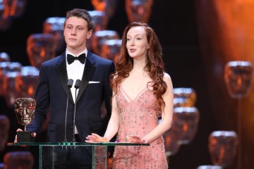 George MacKay and Olivia Grant arrive on stage to present the British Short Film and British Short Animation awards 