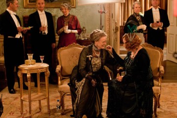 Dame Maggie Smith and Shirley MacLaine, who play two of Downton Abbey's distinguished matriarchs, chat in between takes for season three.