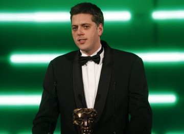 The comedian and MSN's games columnist presents the BAFTA for Strategy. (Pic: BAFTA/Brian Ritchie)