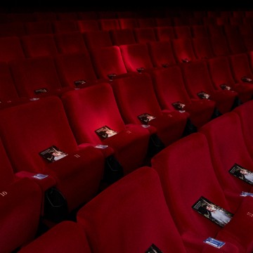 Brochures line the seats ahead of Willimon's Screenwriters' Lecture